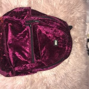 A velvet Burgundy pink book bag